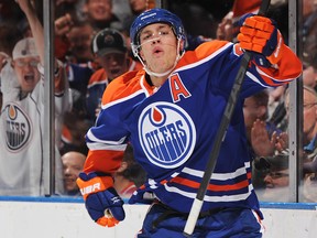 EDMONTON, CANADA - FEBRUARY 12: Taylor Hall #4 of the Edmonton Oilers celebrates scoring the first goal of the night on Kari Lehtonen #32 (not pictured) of the Dallas Stars during the NHL game at Rexall Place on February 12, 2013 in Edmonton, Canada. (Photo by Derek Leung/Getty Images)