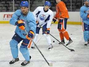 Darcy Hordichuk, left, and his Edmonton Oilers teammates begin their NHL training camp Jan. 14, 2013, at Rexall Place in Edmonton. Photo by Shaughn Butts/Edmonton Journal