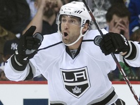 Jarret Stoll, then of the Los Angeles Kings,  celebrates a teammate's goal in April 2012. Stoll was claimed on waivers Tuesday by the Minnesota Wild.