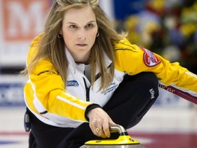 Manitoba skip Jennifer Jones makes a shot during tenth draw curling action against Heather Nedohin and Team Canada at the Scotties Tournament of Hearts on Feb. 20, 2013 in Kingston, Ont. Photo by Ryan Remiorz/The Canadian Press