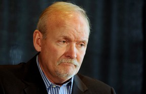 Lindy Ruff pauses during a press conference in his first public appearance two days after being fired as the Buffalo Sabres NHL hockey coach in Buffalo, N.Y., Friday, Feb. 22, 2013. Saying he'll always call Buffalo home, Ruff maintains the itch to continue coaching following a 16-season run. (AP Photo/Gary Wiepert)