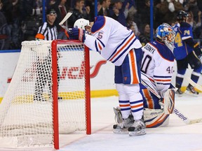 Ladislav Smid slumps after St. Louis scored one of four consecutive goals to defeat the Oilers 4-2. (Photo: Dilip Vishwanat/Getty Images)