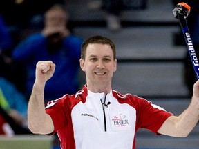 Newfoundland and Labrador skip Brad Gushue reacts to one of his shots during the afternoon draw against Quebec at the Tim Hortons Brier in Edmonton on Friday, March 8, 2013. Gushue beat Quebec's Jean-Michel Menard 5-4 to clinch a playoff berth. Photo by Jonathan Hayward, The Canadian Press