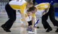 Manitoba skip Jeff Stoughton watches his shot as lead Mark Nichols and second Reid Carruthers sweep during the morning draw Friday, March 8, 2013, against Northwest Territories/Yukon at the Tim Hortons Brier in Edmonton. Photo by Jonathan Hayward, The Canadian Press