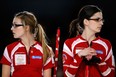 Dean Mouhtaropoulos/Getty Images

Alison Kreviazuk, left, and Lisa Weagle of Canada look in different directions during a game against Denmark on March 17, 2013, in the world women's curling championship at Riga, Latvia.