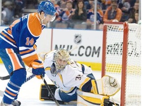 Edmonton Oilers winger Jordan Eberle.zeroes in on Nashville Predators goalie Pekka Rinne on Sunday, March 17, 2013. Photo by Shaughn Butts, Edmonton Journal