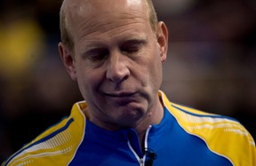 Alberta skip Kevin Martin reacts to a shot during the afternoon draw against Northern Ontario at the Tim Hortons Brier in Edmonton on  March 4, 2013. Photo by /Jonathan Hayward, The Canadian Press