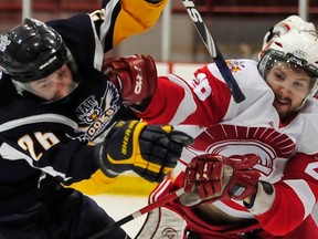 The NAIT Ooks and the SAIT Trojans face off in the 2012-13 ACAC men's hockey final. Photo by Andrew Crossett, ACAC