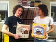 Renny Wilson, left, and Michael Rault show off some of their favourite albums.