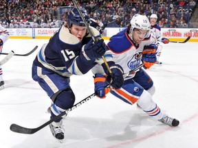 Any game against the Columbus Blue Jackets involves a bellyful of agitator Derek Dorsett. In this rather comical image from the first Oilers-BJs game, Justin Schultz appears to have a guardian angel on his shoulder issuing warnings into his ear. Which, come to think of it, probably isn't so far from the truth.