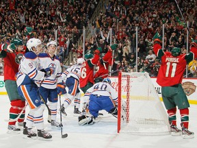 This game was every bit as ugly as those Minnesota unis. (Photo by Bruce Kluckhohn/NHLI via Getty Images)