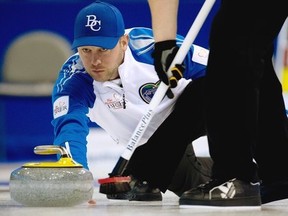 British Columbia skip Andrew Bilesky makes a shot during the afternoon draw against Northwest Territories/Yukon at the Tim Hortons Brier in Edmonton, Alta. Thursday, March 7, 2013. THE CANADIAN PRESS/Jonathan Hayward