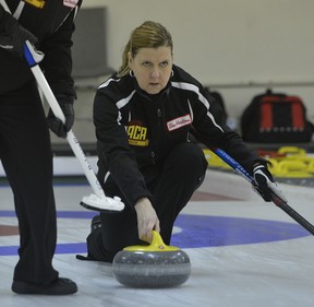 LARRY WONG / EDMONTON JOURNAL

Deb Santos delivers a rock in the final of the Alberta senior women's curling championship against defending champion Cathy King at the Granite Curling Club on Feb. 17,  2013.