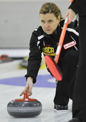 ED KAISER/EDMONTON JOURNAL

Deb Santos throws a rock in the final of the Alberta senior women's curling championship at the Granite Curling Club on Feb. 13, 2013.