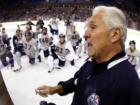 Assistant coach Wayne Fleming gives on ice instruction during 2009-10 Edmonton Oilers training camp in September 2009. Fleming died of brain cancer Tuesday, March 26, 2013 at age 62.