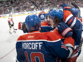 Edmonton Oilers players celebrate a goal against the Calgary Flames. Edmonton won 4-1. (Photo: Andy Devlin/Getty Images)