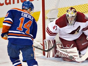 Edmonton Oilers forward Jordan Eberle tries to beat Phoenix Coyotes goalie Mike Smith during play Wednesday, April 10, 2013, at Rexall Place. Photo by Jason Franson, The Canadian Press