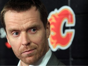 Calgary Flames goalie Miikka Kiprusoff listens to a question during a press conference at the Saddledome in Calgary on April 3, 2013. Photo by Stuart Gradon, Calgary Herald