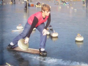 A curler throws a rock from a crampit during a New Zealand bonspiel that's been held on an outdoor lake since 1879.