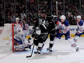 Mike Richards and Jeff Carter (a.k.a. "the Goal Scorer") slip behind the Oilers penalty killing troika of (L-R) Corey Potter, Jerred Smithson, and Nick Schultz to score the game winning goal late in the first period.  (Photo by Noah Graham/NHLI via Getty Images)