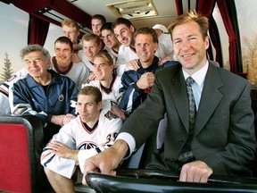 Oiler special supplement Kevin Lowe , Doug Weight , Ryan Smyth. Tom Poti, Janne Niinimma Rem Murray , Todd Marchant, Bill Ranford, Ted Green and Craig MacTavish

KEVIN LOWE driving the bus with other team players behind him / 990923.SOU
EDMONTON OILERS
SEP 30, 1999 PAGE I1
CREDIT: GREGORY SOUTHAM