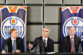 Edmonton Oilers new senior vice-president Scott Howson, left, new general manager Craig MacTavish and team president Kevin Lowe (right)attend a press conference in Edmonton, Alta., on Monday April 15, 2013. THE CANADIAN PRESS/Jason Franson
