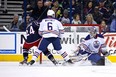 Derek Mackenzie #24 of the Columbus Blue Jackets skates past Ryan Whitney #6 of the Edmonton Oilers to beat Devan Dubnyk #40 of the Edmonton Oilers for a goal during the first period on March 5, 2013 at Nationwide Arena in Columbus, Ohio.
(March 4, 2013 - Source: Kirk Irwin/Getty Images North America)