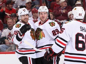 Viktor Stalberg, Brian Bickell and Andrew Shaw have delivered lots of bang for a very reasonable buck in Chicago, less than $2 MM cap hit for the three players combined. Stalberg and Bickell are potential value free agents this summer. (Photo: Christian Petersen/Getty Images North America)