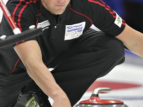 EDMONTON JOURNAL, FILE

Kevin Koe lead Nolan Thiessen throws a rock during the Continental Cup of Curling at Servus Place in St. Albert in January 2011.