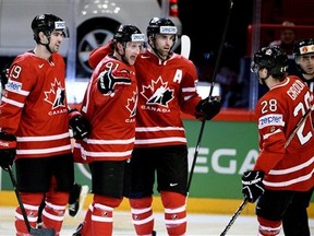 Canada's first powerplay unit was firing on all cylinders on Friday. (L-R) Justin Schultz, Steven Stamkos, Andrew Ladd, and Claude Giroux all had multiple-point games as Canada's win over Belarus. (Photo: The Canadian Press)