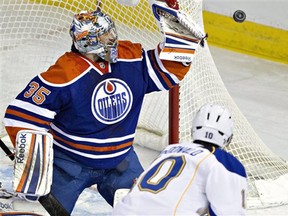 Edmonton Oilers goalie Nikolai Khabibulin in action against the St. Louis Blues in March 2013. Canadian Press photo