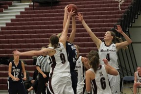 The MacEwan Griffins women's basketball team plays the Mount Royal Cougars in Alberta Collegiate Athletics Conference play in March 2012. Grant MacEwan has been given probationary member status in the Canada West Universities Athletics Association starting in September, with teams beginning conference play next year. MacEwan supplied file photo