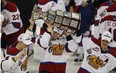 Members of the Edmonton Oil Kings hoist the Ed Chynoweth Cup after beating the Portland Winterhawks in Game 7 of the league championship May 13, 2012, at Edmonton's rexall Place. Photo by Greg Southam, Edmonton Journal file