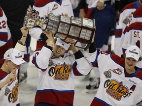 Members of the Edmonton Oil Kings hoist the Ed Chynoweth Cup after beating the Portland Winterhawks in Game 7 of the league championship May 13, 2012, at Edmonton's rexall Place. Photo by Greg Southam, Edmonton Journal file