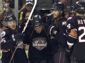Oklahoma City Barons had some fine moments in the playoffs, including a thrilling come-from-behind win in Grand Rapids in Game Six capped by a game winner from Anton Lander (centre). (Photo credit: okcbarons.com)