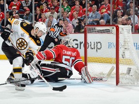 This was the best scoring chance in 52 minutes of overtime in Game 1. Somehow, Boston's Kaspars Daugavins was unable to finish the play, and the game. (Photo by Bill Smith/NHLI via Getty Images)