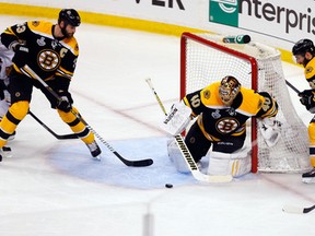 Boston defensive stalwarts Zdeno Chara, Tuukka Rask, and Patrice Bergeron are three of the main reasons Chicago snipers like Jonathan Toews and (Obscured) have scored one goal in the last two games. (Photo: Jim Rogash/Getty Images North America)