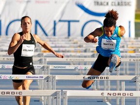 EDMONTON, ALTA:  JUNE 12, 2010 -- Angela Whyte about to win the race ahead of Jessica Zelinka in the women's 100M hurdles at the Edmonton International Track Classic at Foote Field in Edmonton June 12, 2010. (Ed Kaiser-Edmonton Journal)