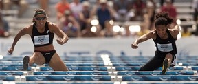 EDMONTON, ALBERTA:JUNE 29,2013 --LoLo Jones from the United States pushes past Angela Whyte of Canada to win the women's 100 metre hurdles at the Edmonton International Track Classic at Foote Field on June 29, 2013 in Edmonton.  Greg Southam/Edmonton Journal