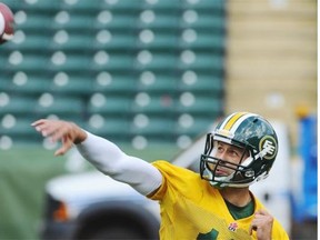 Edmonton Eskimos quarterback Mike Reilly throws with a compression sleeve on his right arm during Monday’s practice at Commonwealth Stadium.
Photograph by: Ed Kaiser, Edmonton Journal