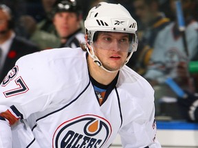 Edmonton Oilers defenceman Denis Grebeshkov in action November 11, 2009, against the Buffalo Sabres. Grebeshkov signed a one-year contract with the Oilers on July 18, 2013, after spending the past three seasons in the KHL. Grebeshkov last played for the Oilers in 2009-10 before being traded to the Nashville Predators.