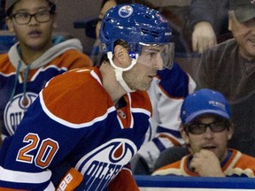 Former Edmonton Oilers centre Eric Belanger has signed a contract to play with Yekaterinburg  of the KHL for the 2013-14 season.