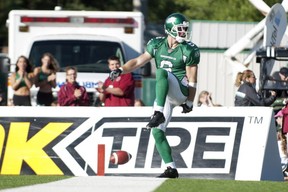 Saskatchewan Roughriders wide receiver Rob Bagg celebrates a touchdown against the Hamilton Tiger-Cats during the first half of CFL football action at Mosaic Stadium on Sunday, September 21, 2013 in Regina. THE CANADIAN PRESS/Liam Richards