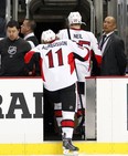 PITTSBURGH, PA - MAY 24:  Daniel Alfredsson #11 of the Ottawa Senators and Chris Neil #25 leave the ice after losing to the Pittsburgh Penguins  in Game Five of the Eastern Conference Semifinals during the 2013 NHL Stanley Cup Playoffs at Consol Energy Center on May 24, 2013 in Pittsburgh, Pennsylvania.  The Penguins defeated the Senators 6-2.  (Photo by Justin K. Aller/Getty Images)