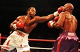 Lennox Lewis (left), who destroyed every heavyweight put in his path, was the undisputed champion of the 1990s.
