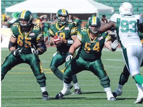 Mike Reilly as the Edmonton Eskimos lose to the Saskatchewan Roughriders 27-30 at Commonwealth stadium in Edmonton, August 24, 2013.
Photograph by: Bruce Edwards, Edmonton Journal