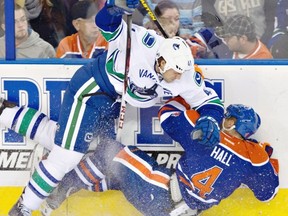 Vancouver Canucks heavies like Andrew Alberts came out hitting high and hard on Saturday night. Unfortunately, there were casualties. (Photo: THE CANADIAN PRESS/Jason Franson)