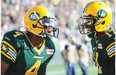 Adarius Bowman #4 and Shamawd Chambers #17 celebrate a touchdown as the Edmonton Eskimos battle the Winnipeg Blue Bombers at Commonwealth stadium in Edmonton, September 14, 2013.
Photograph by: Bruce Edwards, Edmonton Journal