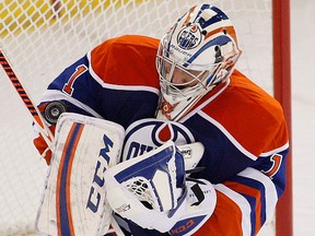 Edmonton Oilers goalie jason LaBarbera makes a save during preseason action against the vancouver Canucks on Sept. 21, 2013. LaBarbera will likely start against the New York Rangers on Tuesday, Sept. 24, in the Oilers' final pre-season game at home.