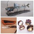 Some of the items for sale include the Dragon Fish (top) by Craig Palmar of Standard, AB; a custom-made knife by Irv Brunas  of Regina (left) and spinner rings by Robyn Cornelius of Edmonton.